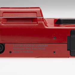 Red plastic camera.