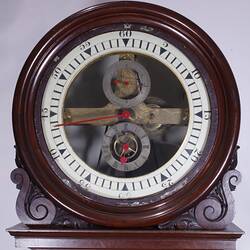 Wooden clock. Detail of clock face.