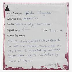 Label on back of white canvas with printed and handwritten text.