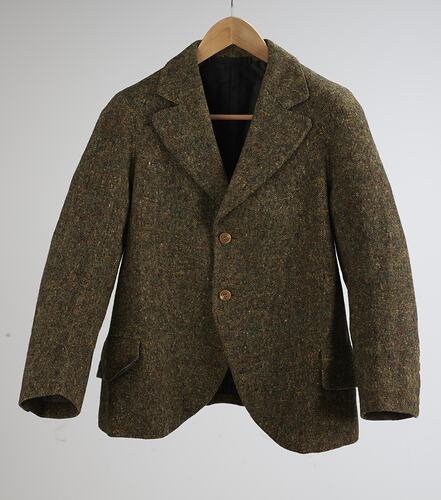Brown tweed suit jacket. Two buttons.