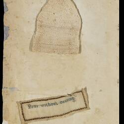 Page 21 of unbound book containing a knitting and sewing sample. White knitted beanie and embroidered label.