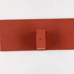 Back of a wooden label and stand.