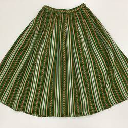 Green and brown patterned long pleated skirt.
