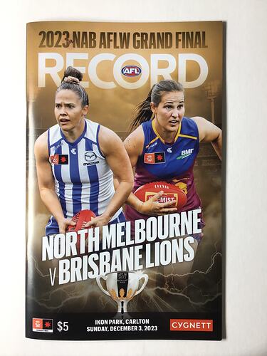 Football record cover with two female footballers and text around.