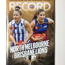 Football record cover with two female footballers and text around.