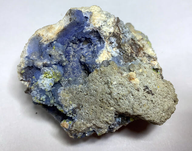 Greyish-blue rock-like formation.