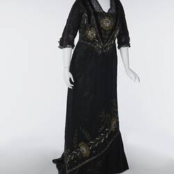 Black, silk satin dress, beading, floral embroidery.