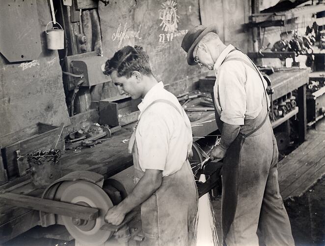 Photograph - Workmen in engineering workshop