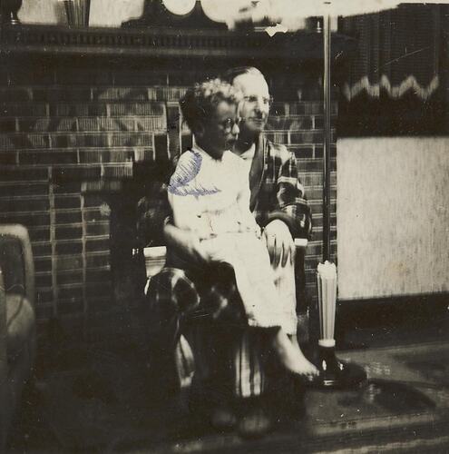 Digital Photograph - Man Holding Boy, Lounge Room, Flemington, 1946
