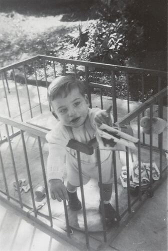 Digital Photograph - Baby in Wooden Playpen, Backyard, Kew, 1954