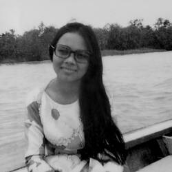 Woman on boat in Vietnam