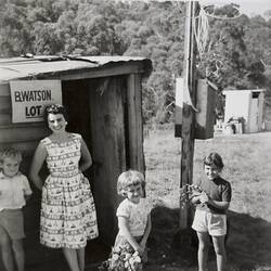 Woman, Two Girls & Boy, in Front of Builder's Shed, Close View, House Building Site, Greensborough, circa 1958