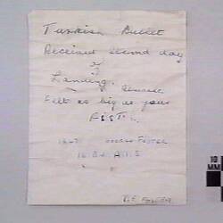 Paper with written text.