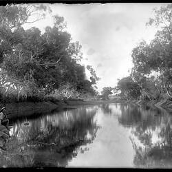 Baldwin Spencer sitting by the side of Attack Creek, Central Australia, 19 September 1901::Spencer and Gillen Collection