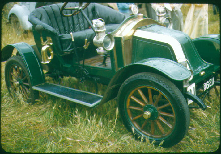Front view of vintage car on display