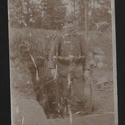 Postcard - German Soldier at Entrance to Dugout, Jul 1916