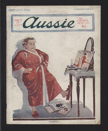 Front cover of a magazine showing a lady exercising in her dressing gown and curlers.