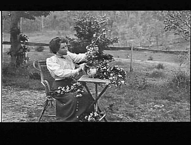 MERRIGUM - CLARA PITTS ARRANGING FLOWERS
