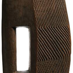 Wooden, wedge-shaped shield.