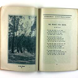 Open book with photo of men in bushland on right page and printed text on left page.