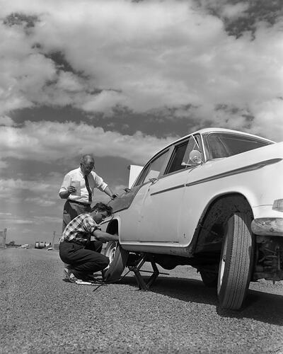 BF Goodrich Australia, Man Fitting a Tyre, Somerton, Victoria, 04 Feb 1960