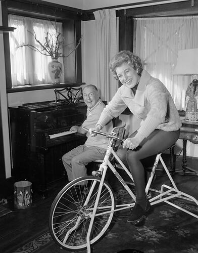 Woman Riding an Exercise Bike, Victoria, 25 May 1962