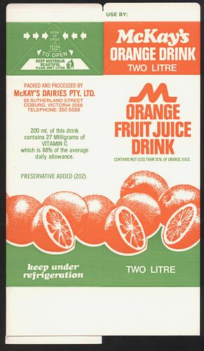 Flat-packed milk carton with illustrated oranges on side.