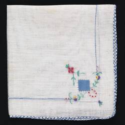 Folded handkerchief with Embroidered Flowers.