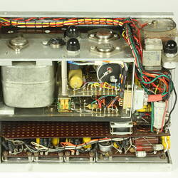 Side view of open metal box. Case removed to show internal wires and components.