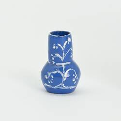 Miniature blue and white vase from a doll's house.