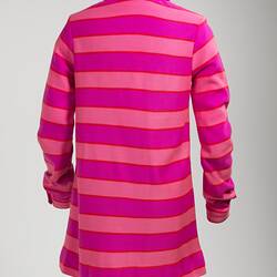 Back of pink striped mini polo-shirt dress. Long sleeve with collar.
