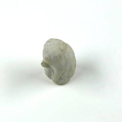 White animal figurine.