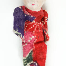 Small Japanese doll in kimono, front side.