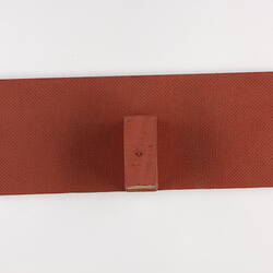 Back of a wooen label and stand.