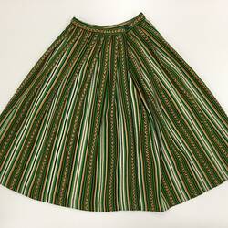 Green and brown patterned long pleated skirt.