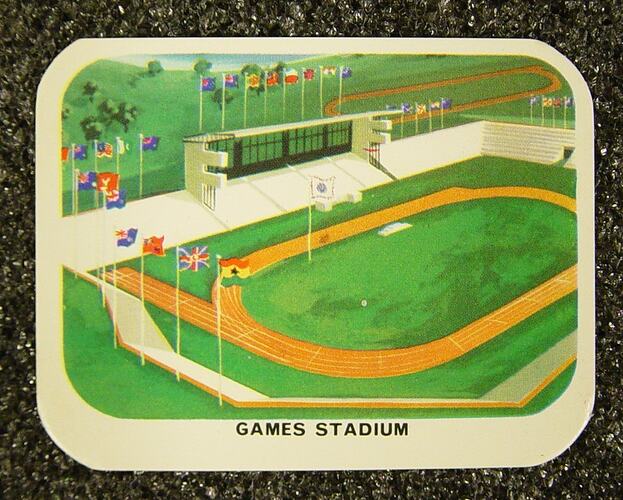 Card with sports stadium, green field and athletics running track.