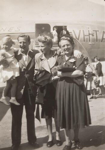 Digital Photograph - British Migrant Family Reunited at Essendon Airport, 1948