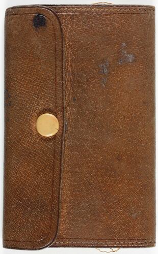 Brown rectangular wallet with metal press stud.