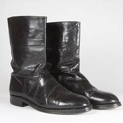 Pair of black leather boots.