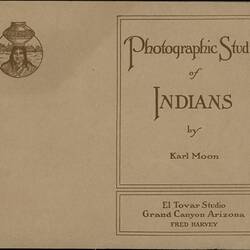 Cover of a booklet, brown with fancy script.