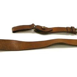 Brown leather belt, in two parts.