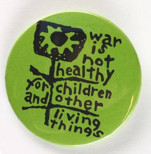 Green badge with black text reading "War is not healthy"