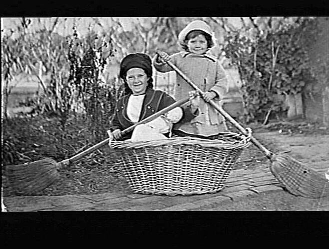 MERRIGUM - DOROTHY AND ETHELWYN PITTS PLAYING IN WASHING BASKET