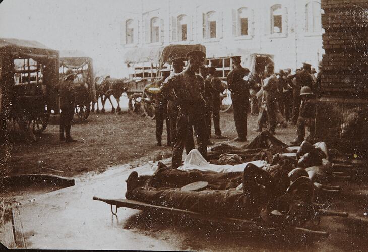 Wounded Soldiers on Stretchers Outside General Hospital