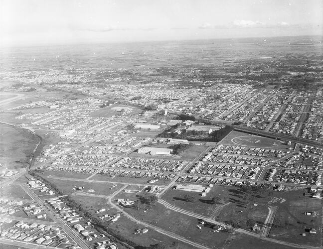 Monochrome aerial image of a suburb.