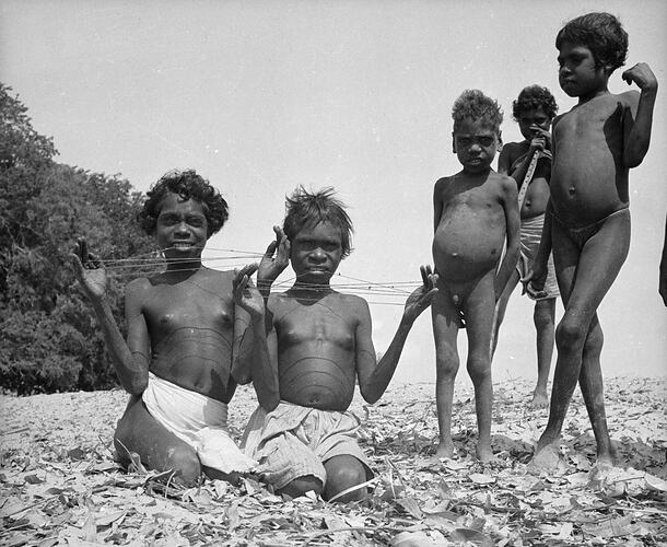 Unknown children playing with string, possibly Northern Australia,1900-59