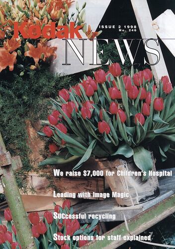 Magazine cover featuring photograph of floral arrangements.