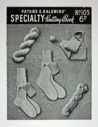 Cover of knitting book showing socks and wool.