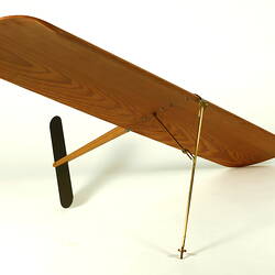 Wooden kite model with metal parts.