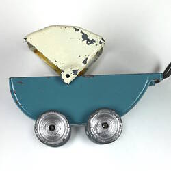 Blue and white toy pram, hood raised.